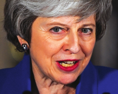 1月16日，在英国伦敦首相府外，英国首相特雷莎·梅在议会下院否决对政府的不信任动议后发表讲话。